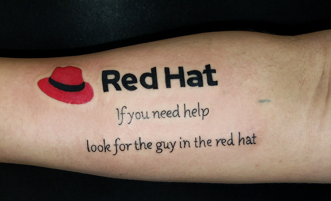 About Fine's Red Hat Tatoo